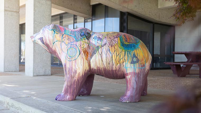 Colorful Bear statue outside Craig Hall.